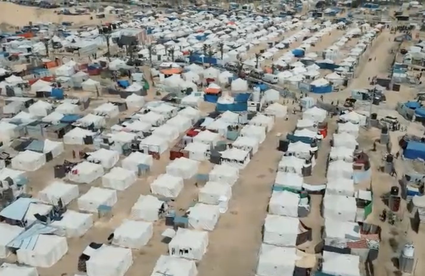 Rows of tents in a displacement camp in Gaza, seen from above